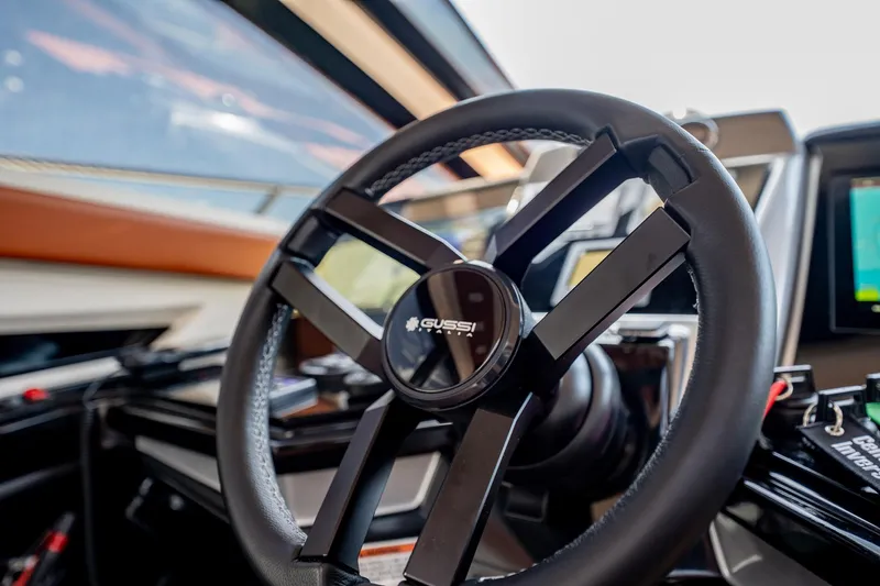 Inverse Entropy Yacht Photos Pics Steering wheel of 2009 Marquis 500 Sport Coupe yacht, featuring Gussi Italia design.