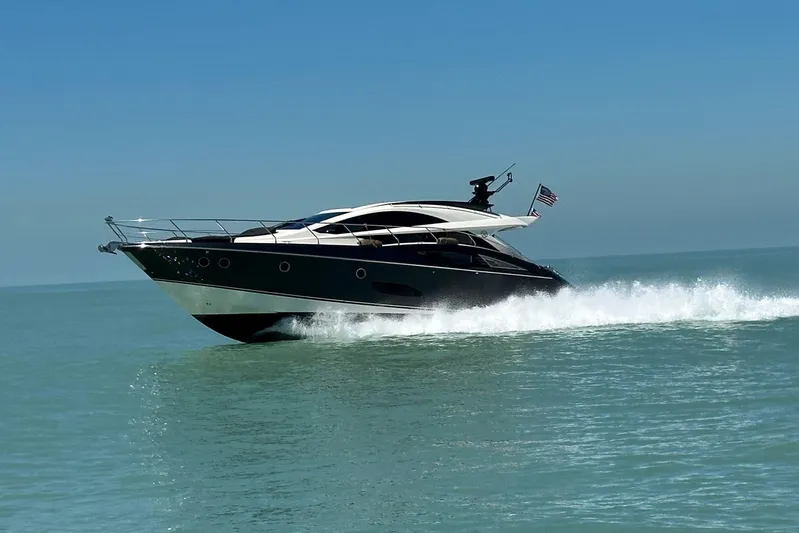 Inverse Entropy Yacht Photos Pics 2009 Marquis 500 Sport Coupe yacht cruising on open water.