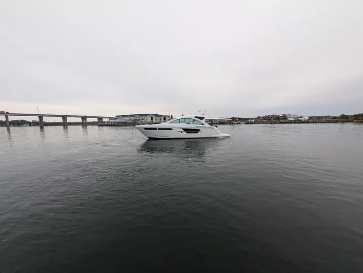 Emilia Yacht Photos Pics 2022 Cruisers Yachts 54 Cantius on calm water.