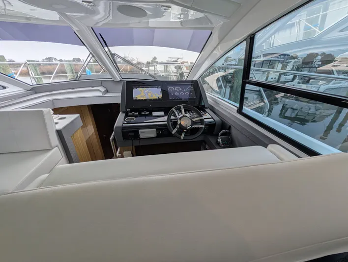 Emilia Yacht Photos Pics Interior view of 2022 Cruisers Yachts 54 Cantius cockpit.