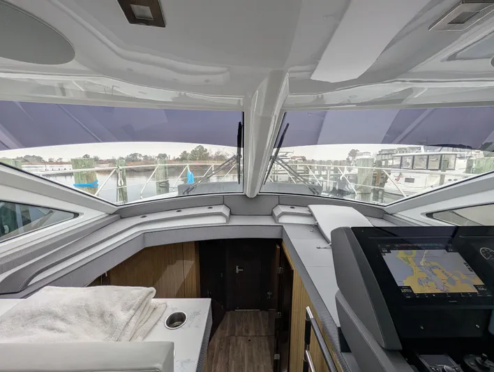 Emilia Yacht Photos Pics Interior view of 2022 Cruisers Yachts 54 Cantius with navigation system.