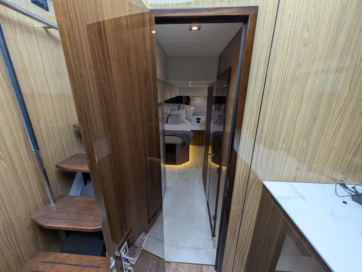 Emilia Yacht Photos Pics Interior of 2022 Cruisers Yachts 54 Cantius with luxurious bedroom.