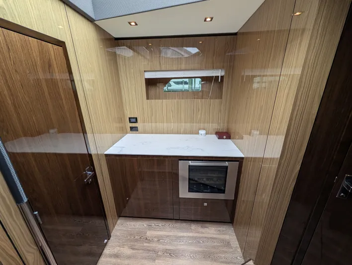 Emilia Yacht Photos Pics Modern kitchen in the 2022 Cruisers Yachts 54 Cantius.