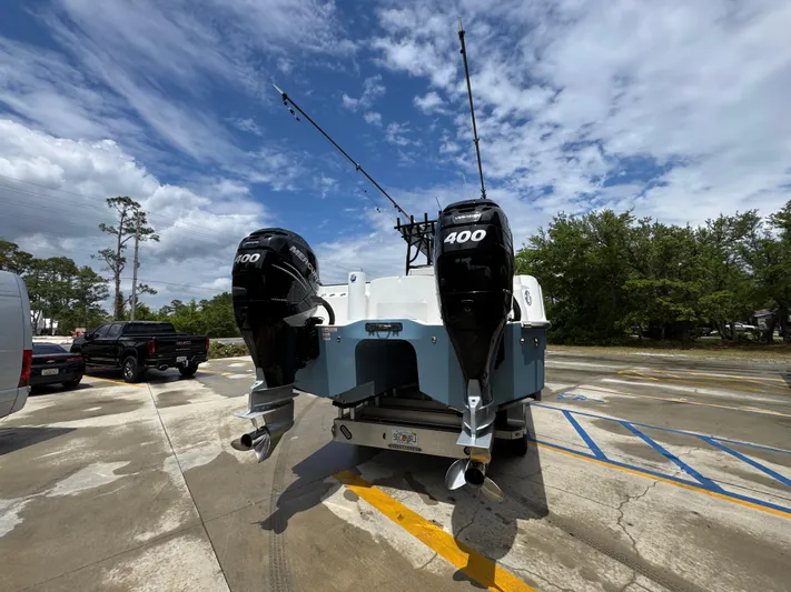  Yacht Photos Pics 2022 Invincible 33 Catamaran with twin 400 horsepower engines on a trailer.