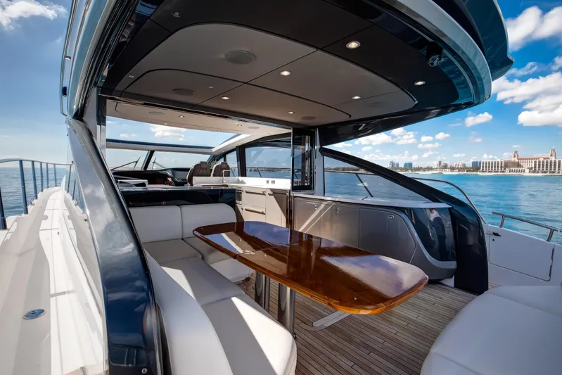 Mermoo Too Yacht Photos Pics 2024 Princess V55 yacht interior with elegant seating and ocean view.