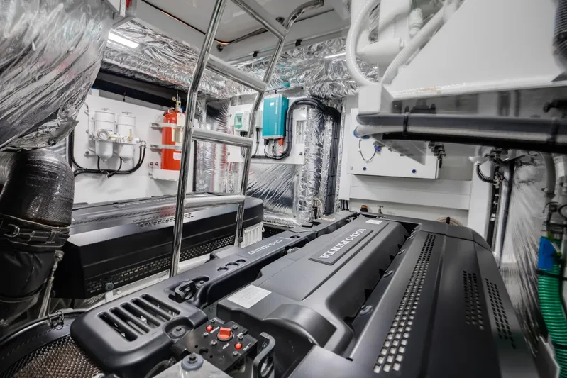 Mermoo Too Yacht Photos Pics Engine room of 2024 Princess V55 yacht, featuring modern equipment and sleek design.