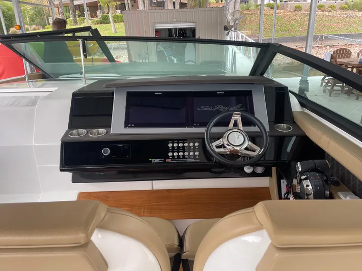  Yacht Photos Pics 2022 Sea Ray 400 SLX helm with modern controls and dual displays.