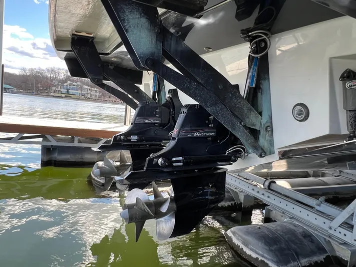  Yacht Photos Pics 2022 Sea Ray 400 SLX boat with dual MerCruiser engines docked on a lake.
