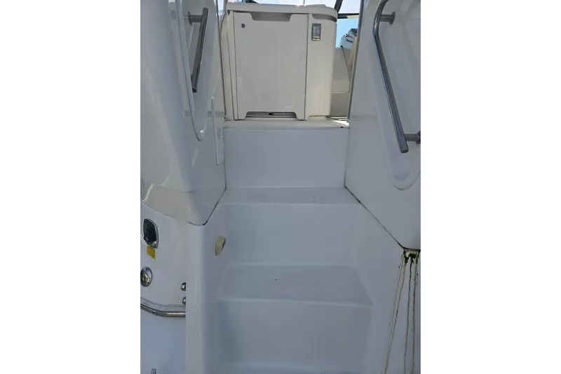 Long Time Comin' Yacht Photos Pics Staircase on 2000 Cruisers Yachts 4450 Express Motoryacht, leading to upper deck.