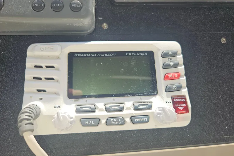 Long Time Comin' Yacht Photos Pics Standard Horizon Explorer GPS radio on 2000 Cruisers Yachts 4450 Express Motoryacht dashboard.