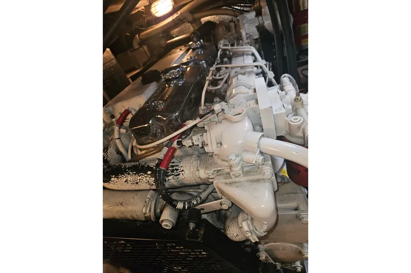 Long Time Comin' Yacht Photos Pics Engine of 2000 Cruisers Yachts 4450 Express Motoryacht, detailed view.