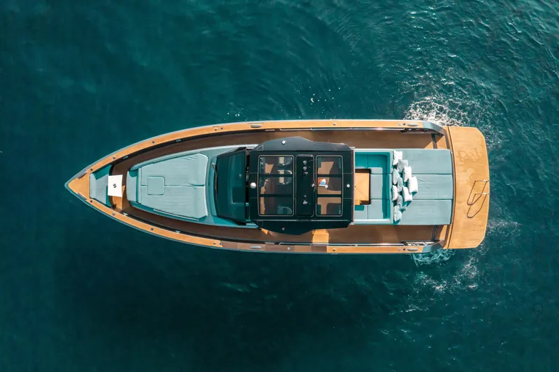  Yacht Photos Pics Aerial view of 2021 Pardo Yachts 50 luxury yacht on blue water.