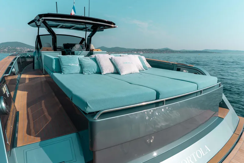  Yacht Photos Pics Luxurious 2021 Pardo Yachts 50 with sunbed, cruising on serene waters.