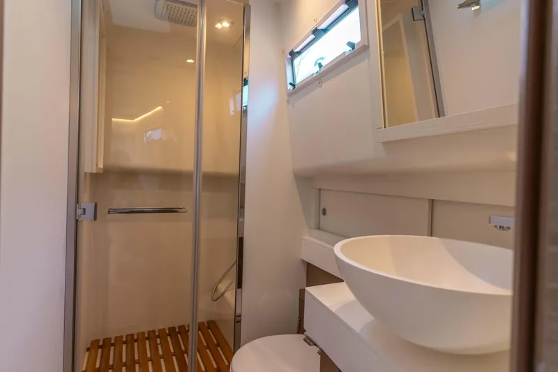  Yacht Photos Pics Luxurious bathroom interior of 2021 Pardo Yachts 50 with modern fixtures and elegant design.