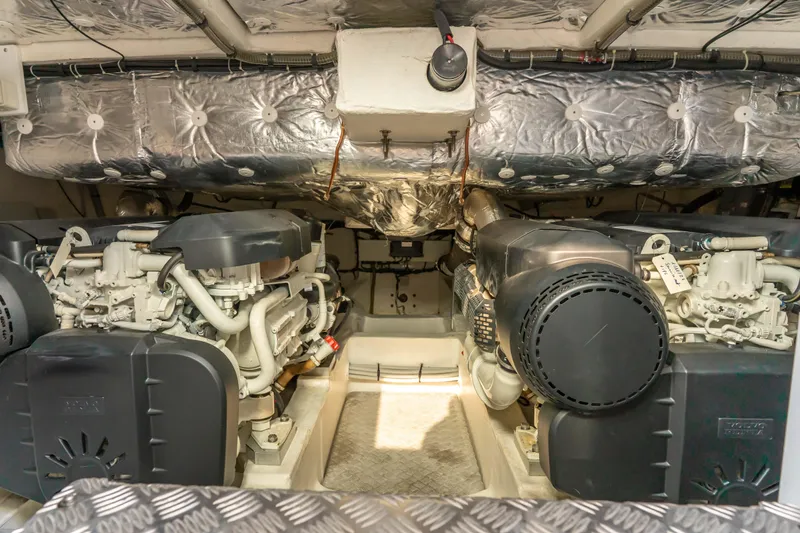  Yacht Photos Pics Engine room of 2021 Pardo Yachts 50, showcasing dual engines and insulated ceiling.