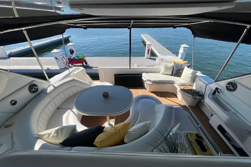 Abeona Yacht Photos Pics Luxurious 1997 Sea Ray 500 Sundancer yacht interior with elegant seating and waterfront view.