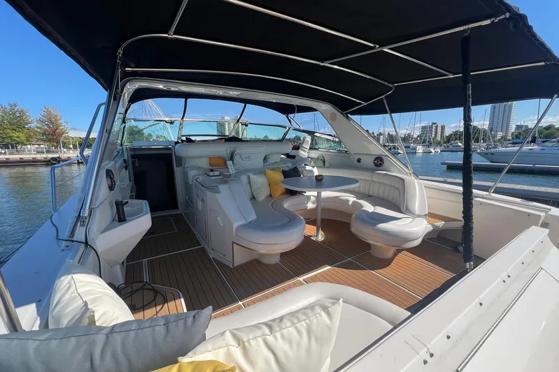 Abeona Yacht Photos Pics Luxurious 1997 Sea Ray 500 Sundancer yacht interior with elegant seating and waterfront view.