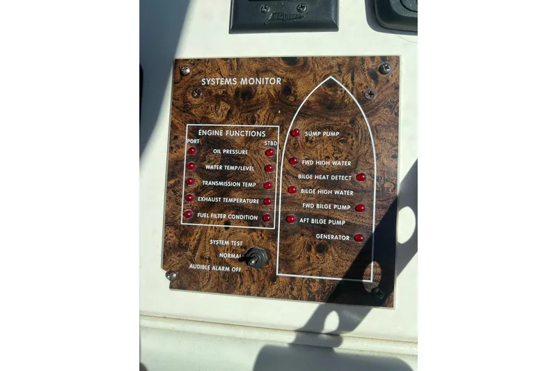 Abeona Yacht Photos Pics 1997 Sea Ray 500 Sundancer systems monitor panel with engine and bilge indicators.