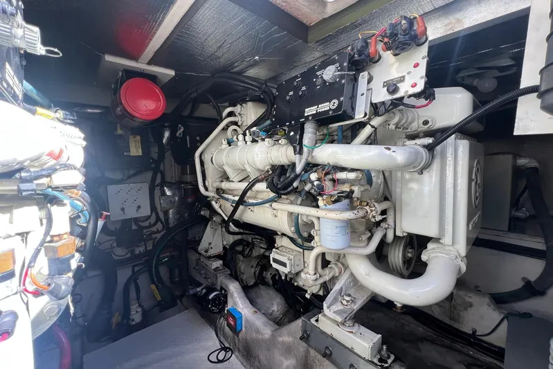 Abeona Yacht Photos Pics Engine room of a 1997 Sea Ray 500 Sundancer, showcasing detailed mechanical components.