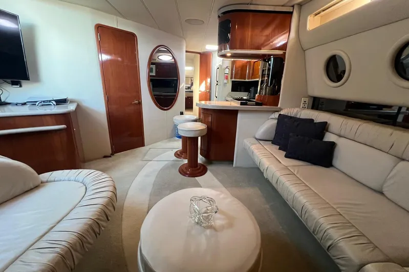 Abeona Yacht Photos Pics Luxurious interior of a 1997 Sea Ray 500 Sundancer yacht with elegant seating and modern amenities.