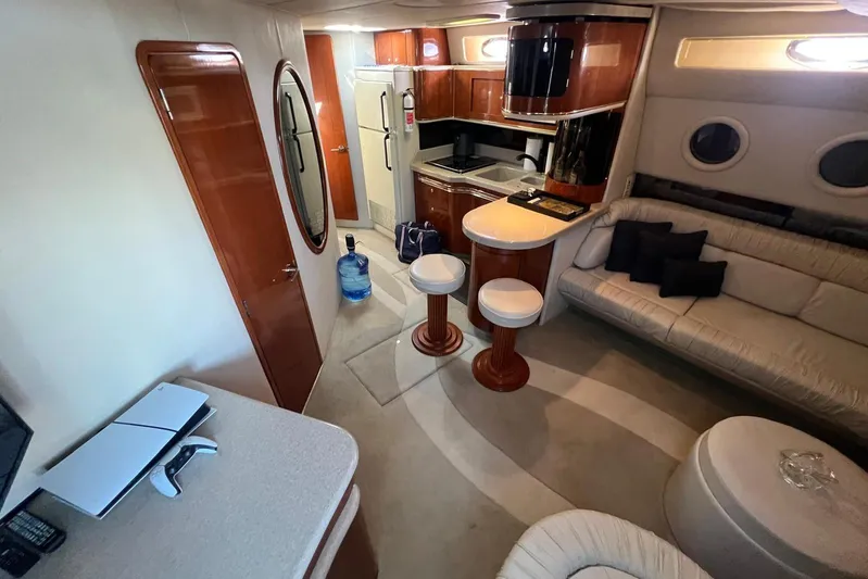 Abeona Yacht Photos Pics Luxurious interior of a 1997 Sea Ray 500 Sundancer yacht with modern amenities.