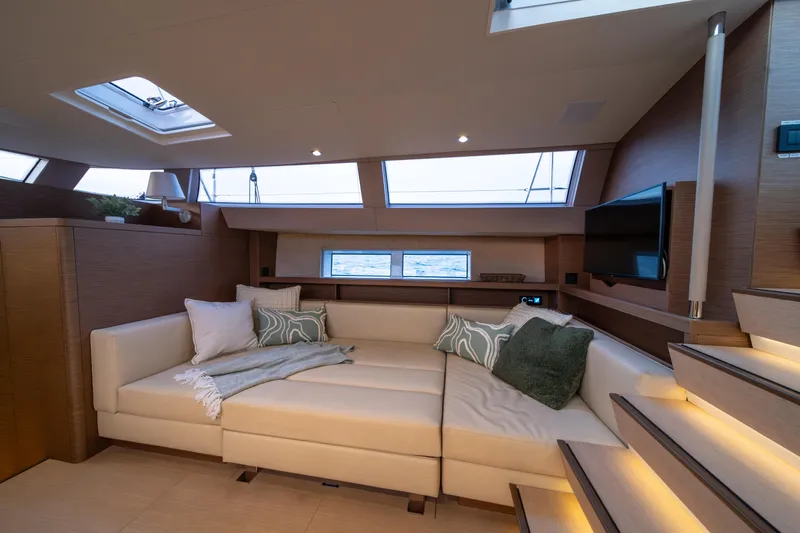 Fortitude Yacht Photos Pics Luxurious CNB 66 yacht interior, 2021 model, featuring elegant seating and modern design.