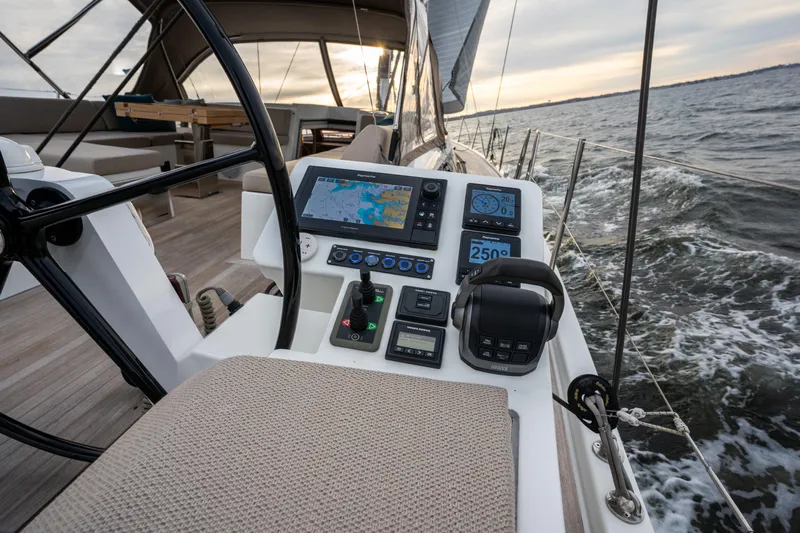 Fortitude Yacht Photos Pics Sailing yacht CNB 66 cockpit with navigation equipment, 2021 model, cruising on open water.