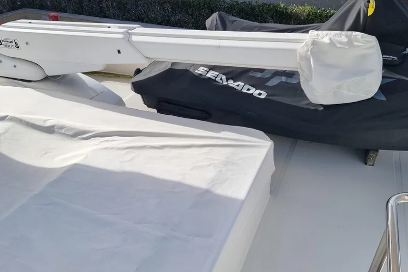 M/y "catherine" Yacht Photos Pics Ferretti Yachts 680 (2002) deck with covered equipment and Sea-Doo jet ski.