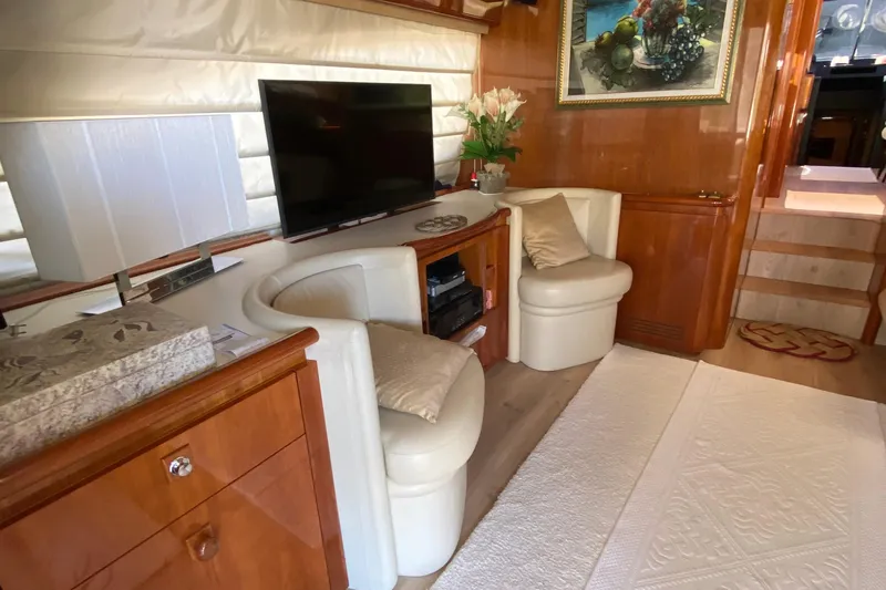 M/y "catherine" Yacht Photos Pics Luxurious interior of 2002 Ferretti Yachts 680 with elegant seating and modern decor.