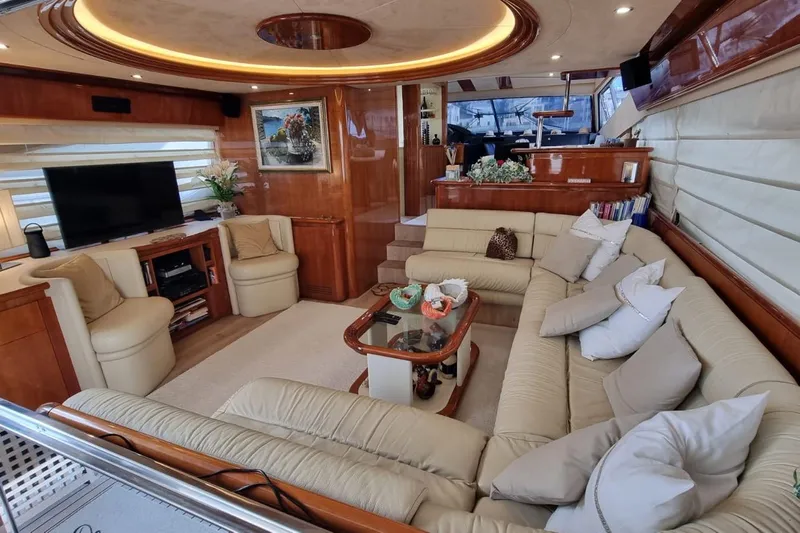 M/y "catherine" Yacht Photos Pics Luxurious interior of 2002 Ferretti Yachts 680 with plush seating and elegant decor.