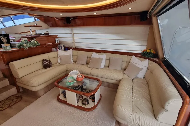 M/y "catherine" Yacht Photos Pics Luxurious interior of 2002 Ferretti Yachts 680 with elegant beige seating and decor.