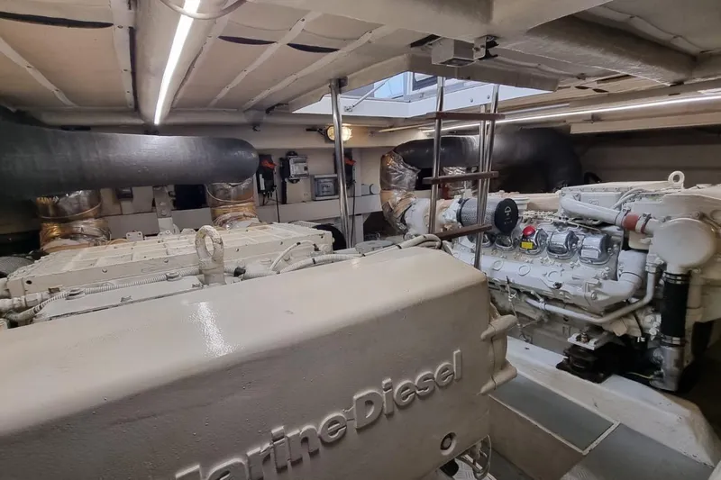 M/y "catherine" Yacht Photos Pics Engine room of a 2002 Ferretti Yachts 680, featuring Marine Diesel engines.
