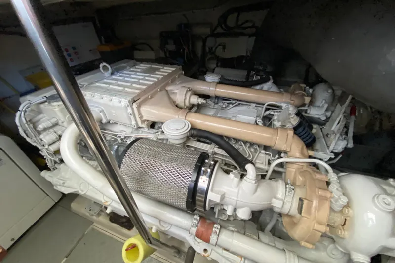 M/y "catherine" Yacht Photos Pics Engine room of a 2002 Ferretti Yachts 680, showcasing detailed mechanical components.