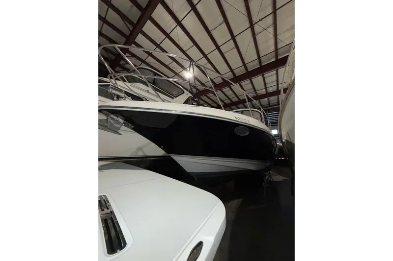 Easy Roller Yacht Photos Pics 2009 Regal Commodore 3760 IO boat in indoor storage facility.