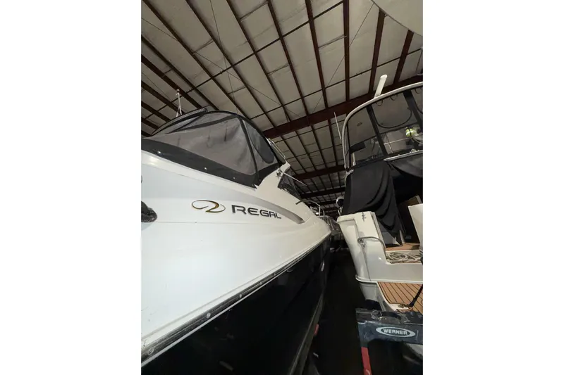 Easy Roller Yacht Photos Pics 2009 Regal Commodore 3760 IO boat in storage, side view.