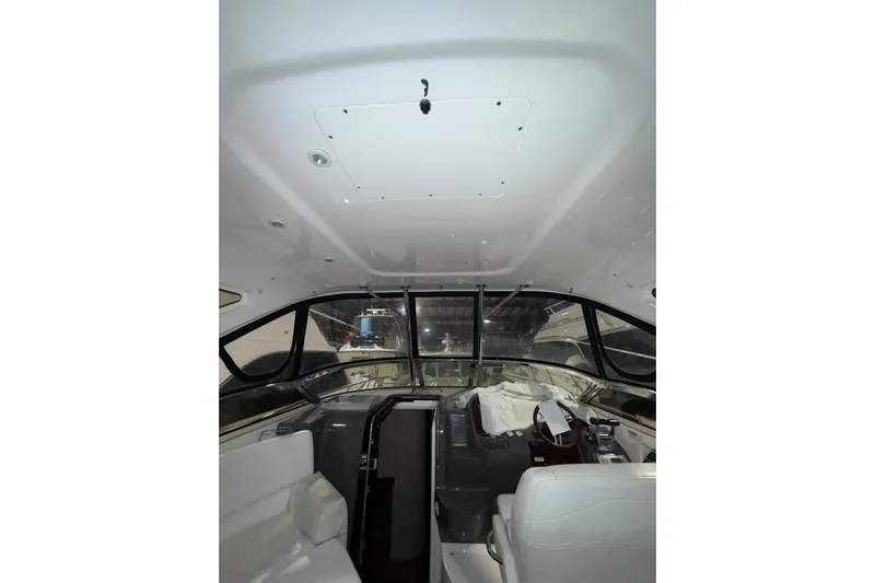 Easy Roller Yacht Photos Pics 2009 Regal Commodore 3760 IO boat interior with seating and helm.