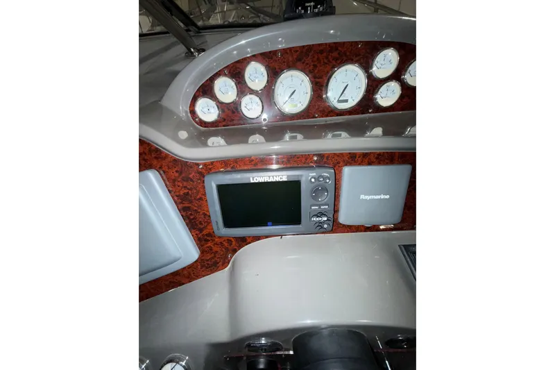 Easy Roller Yacht Photos Pics 2009 Regal Commodore 3760 IO dashboard with gauges and navigation equipment.