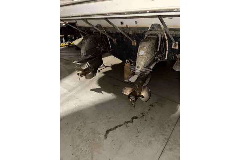 Easy Roller Yacht Photos Pics 2009 Regal Commodore 3760 IO boat propellers in a garage setting.