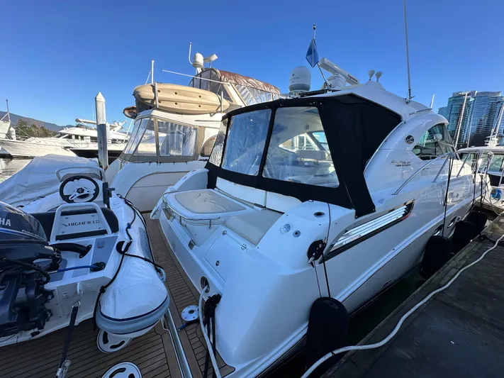  Yacht Photos Pics 2012 Sea Ray 470 Sundancer yacht docked at marina, featuring sleek design and modern amenities.