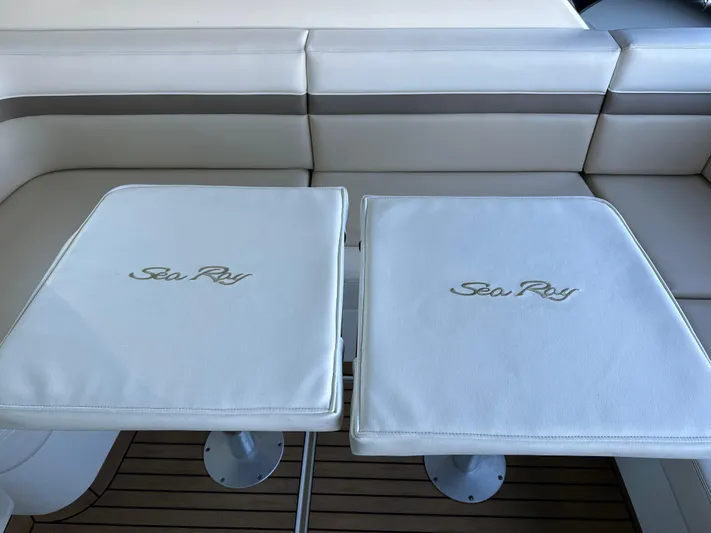  Yacht Photos Pics Luxury seating area on 2012 Sea Ray 470 Sundancer yacht with branded cushions.