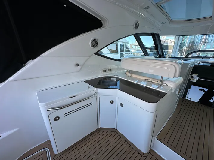  Yacht Photos Pics 2012 Sea Ray 470 Sundancer yacht interior with sleek kitchenette and modern design.