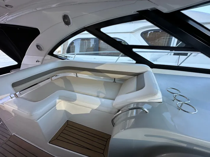  Yacht Photos Pics Luxurious interior of 2012 Sea Ray 470 Sundancer yacht with sleek seating and modern design.