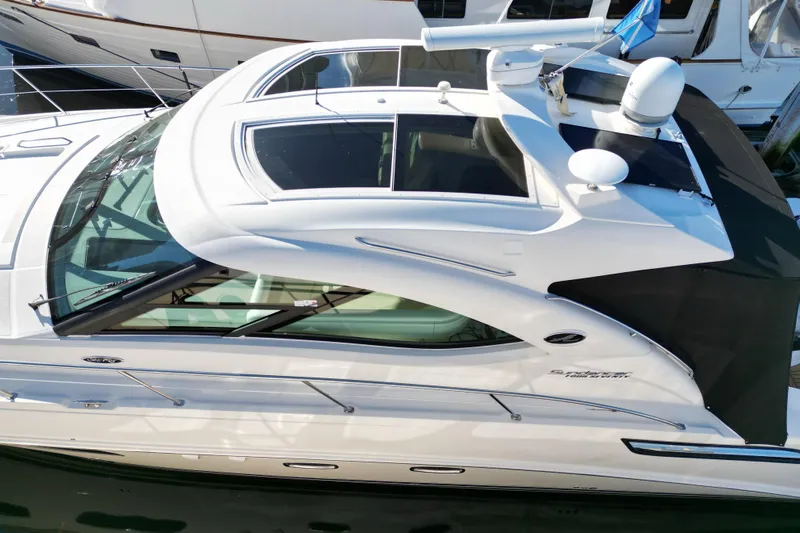 Yacht Photos Pics 2012 Sea Ray 470 Sundancer yacht with sleek design and modern features, docked at marina.