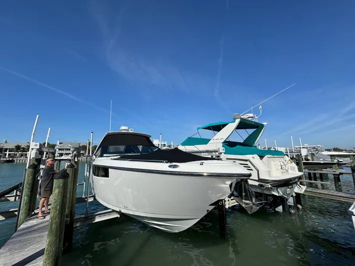 Inception Yacht Photos Pics 2023 Monterey 385 SS boat docked in sunny harbor.