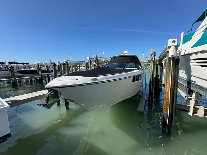 Inception Yacht Photos Pics Monterey 385 SS 2023 boat docked in marina under sunny skies.