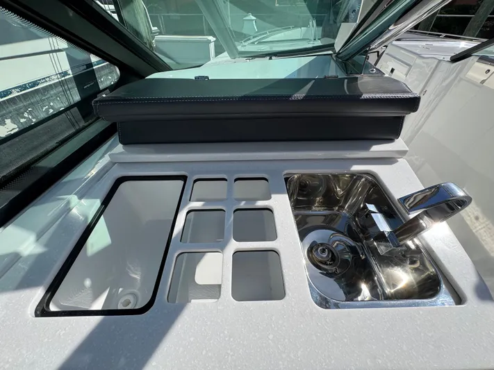 Inception Yacht Photos Pics Monterey 385 SS 2023 boat kitchen with sink and storage.