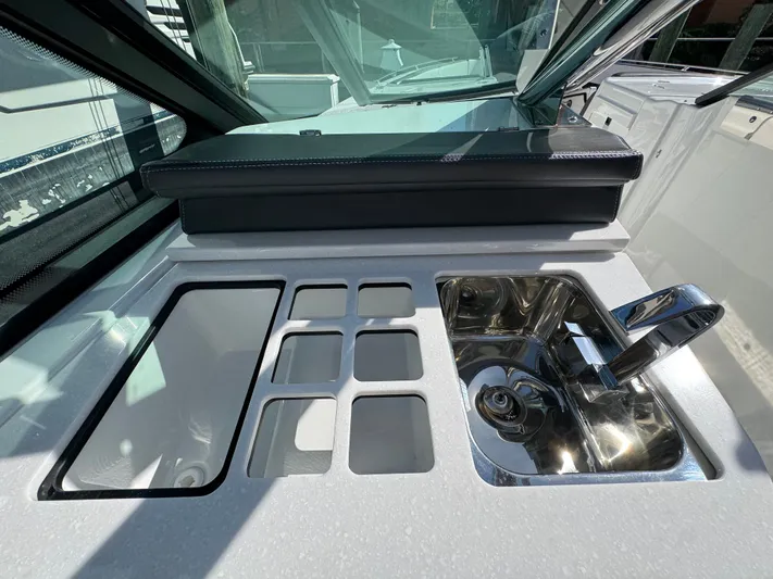 Inception Yacht Photos Pics Monterey 385 SS 2023 boat kitchen with sink and storage.