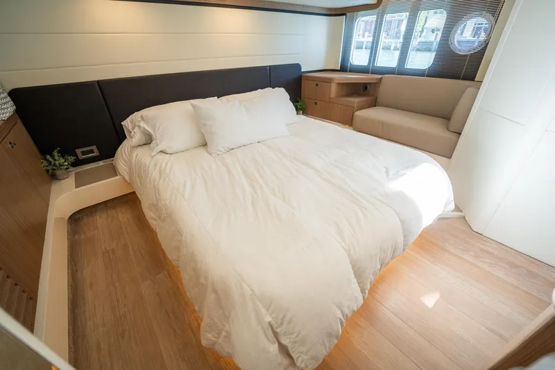 Holy Moly Yacht Photos Pics Luxurious bedroom interior of 2020 Absolute 50 Fly yacht with modern design.
