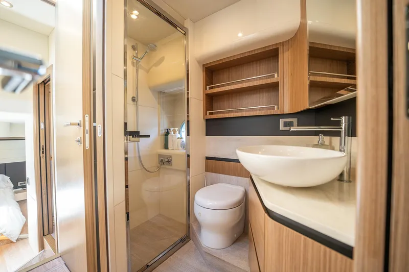 Holy Moly Yacht Photos Pics Luxurious bathroom in 2020 Absolute 50 Fly yacht with modern fixtures and elegant design.
