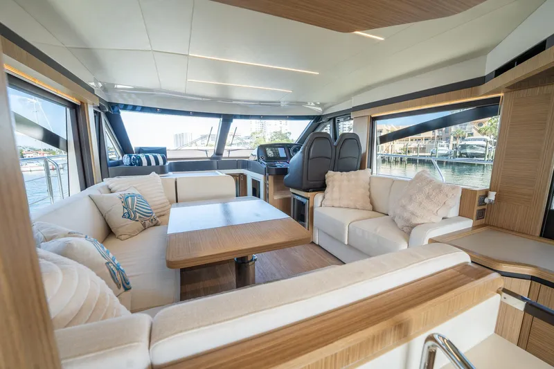 Holy Moly Yacht Photos Pics Luxurious interior of 2020 Absolute 50 Fly yacht with elegant seating and modern design.